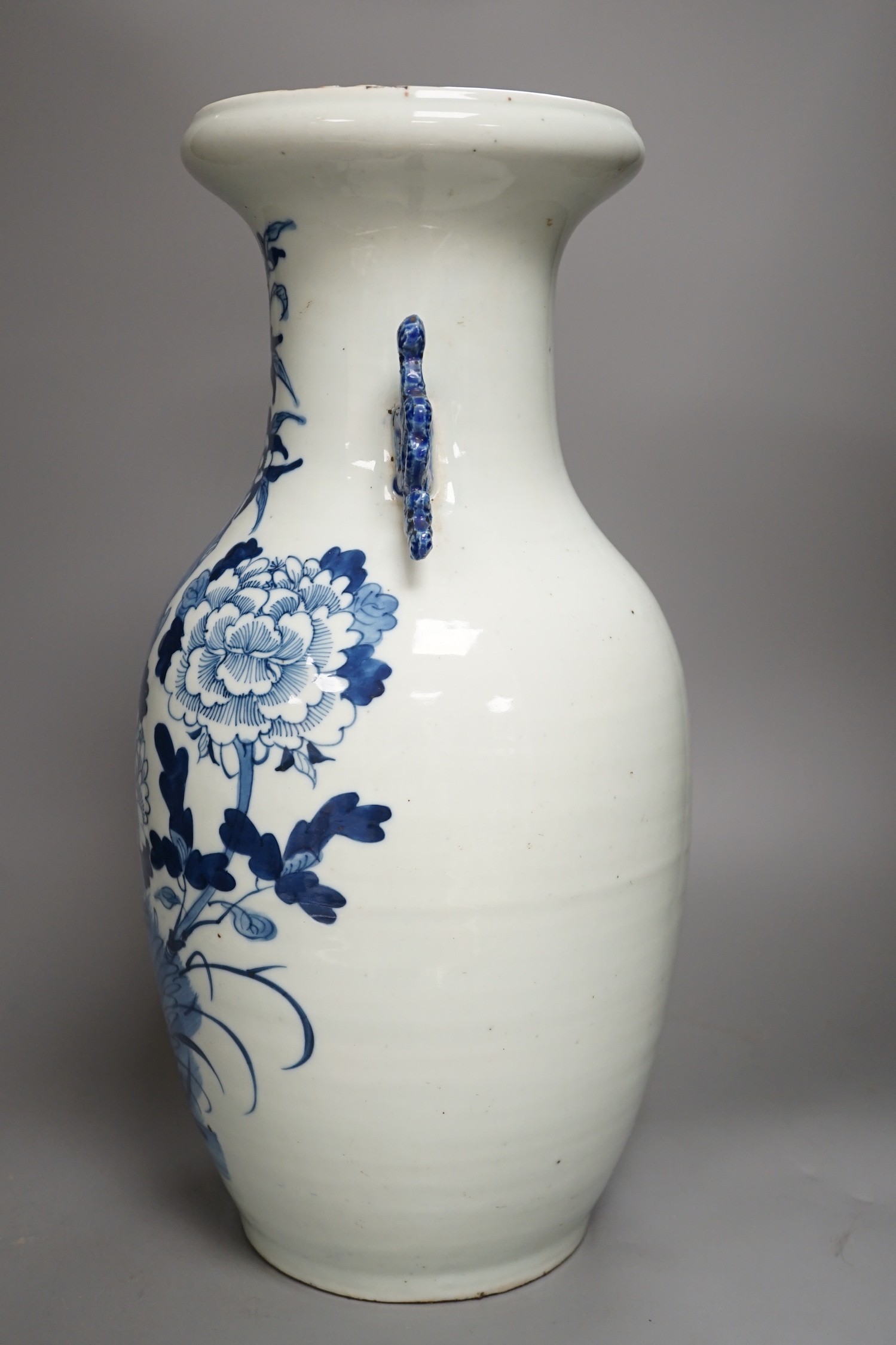 A large late 19th/early 20th century Chinese blue and white vase, 43cm tall